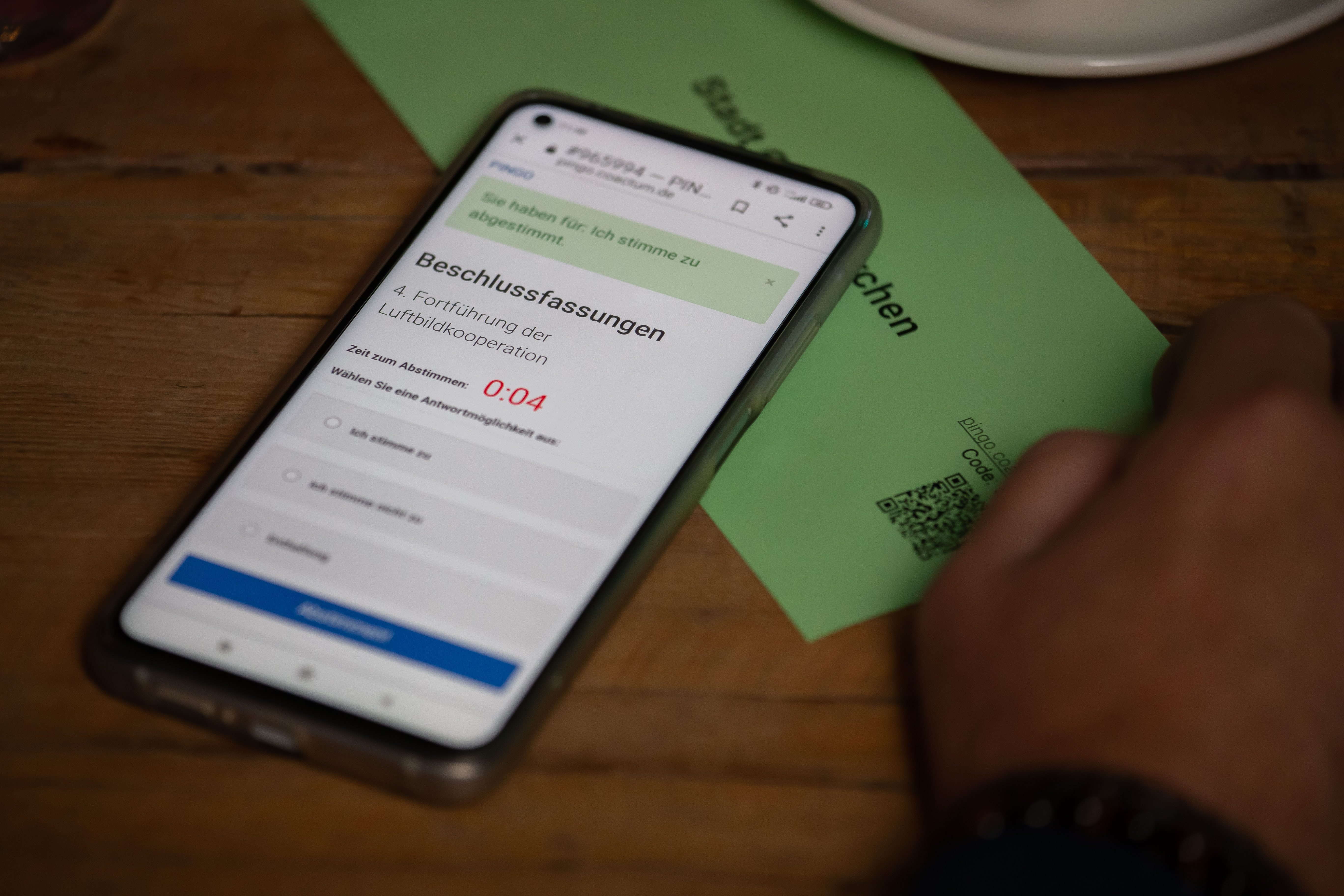 Abstimmung der Beschlüsse per Handy